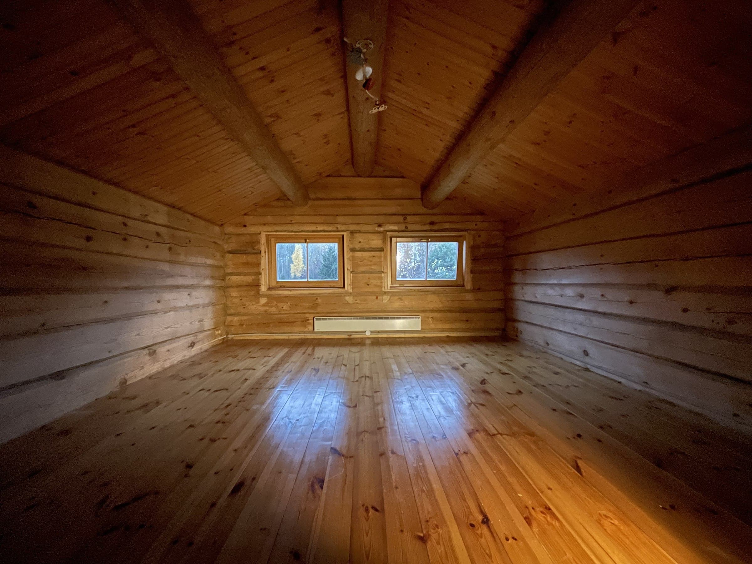 Bare log-cabin shell before any construction